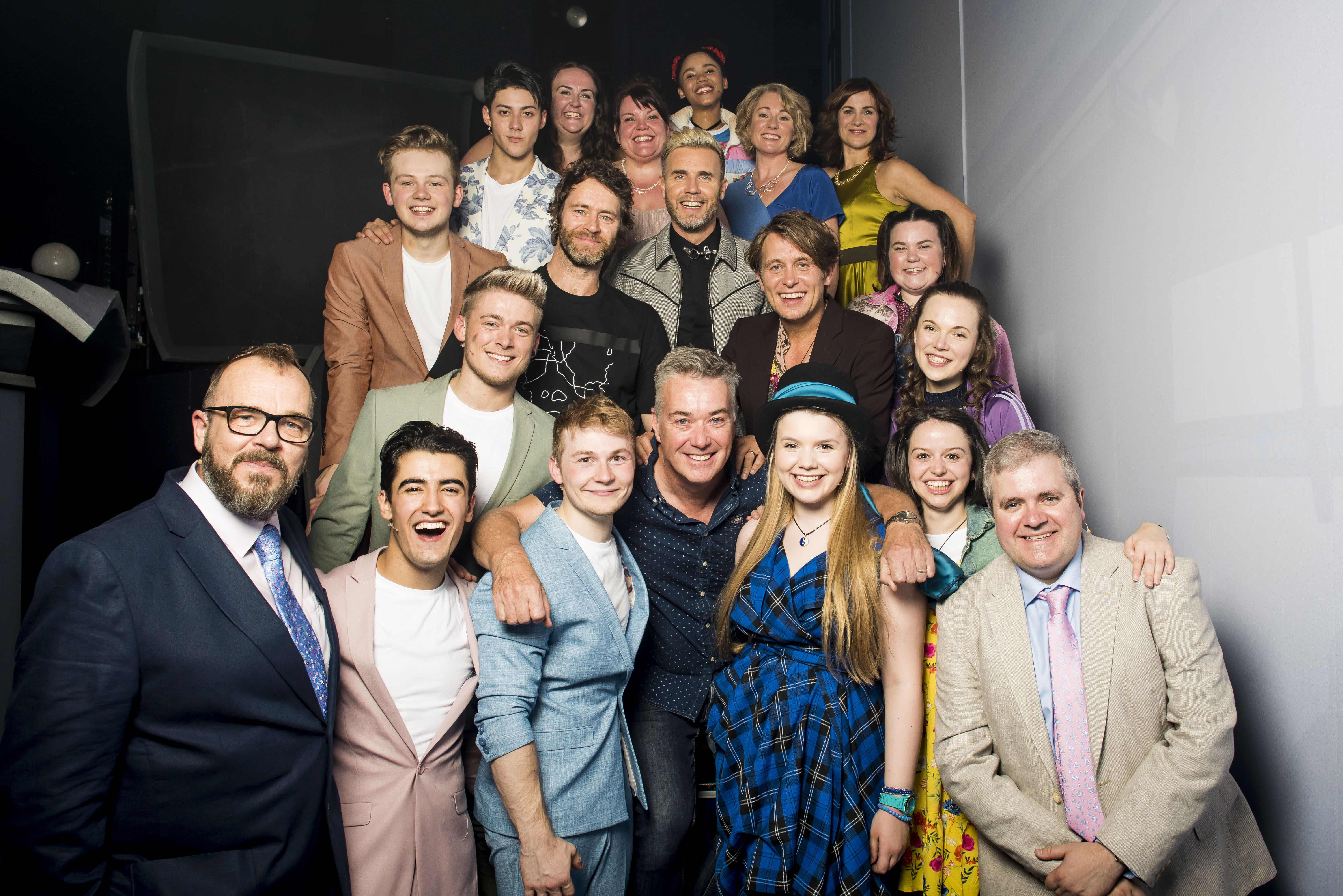 Director Kim Gavin (front centre) with Take That and the cast of THE BAND, credit Matt Crockett