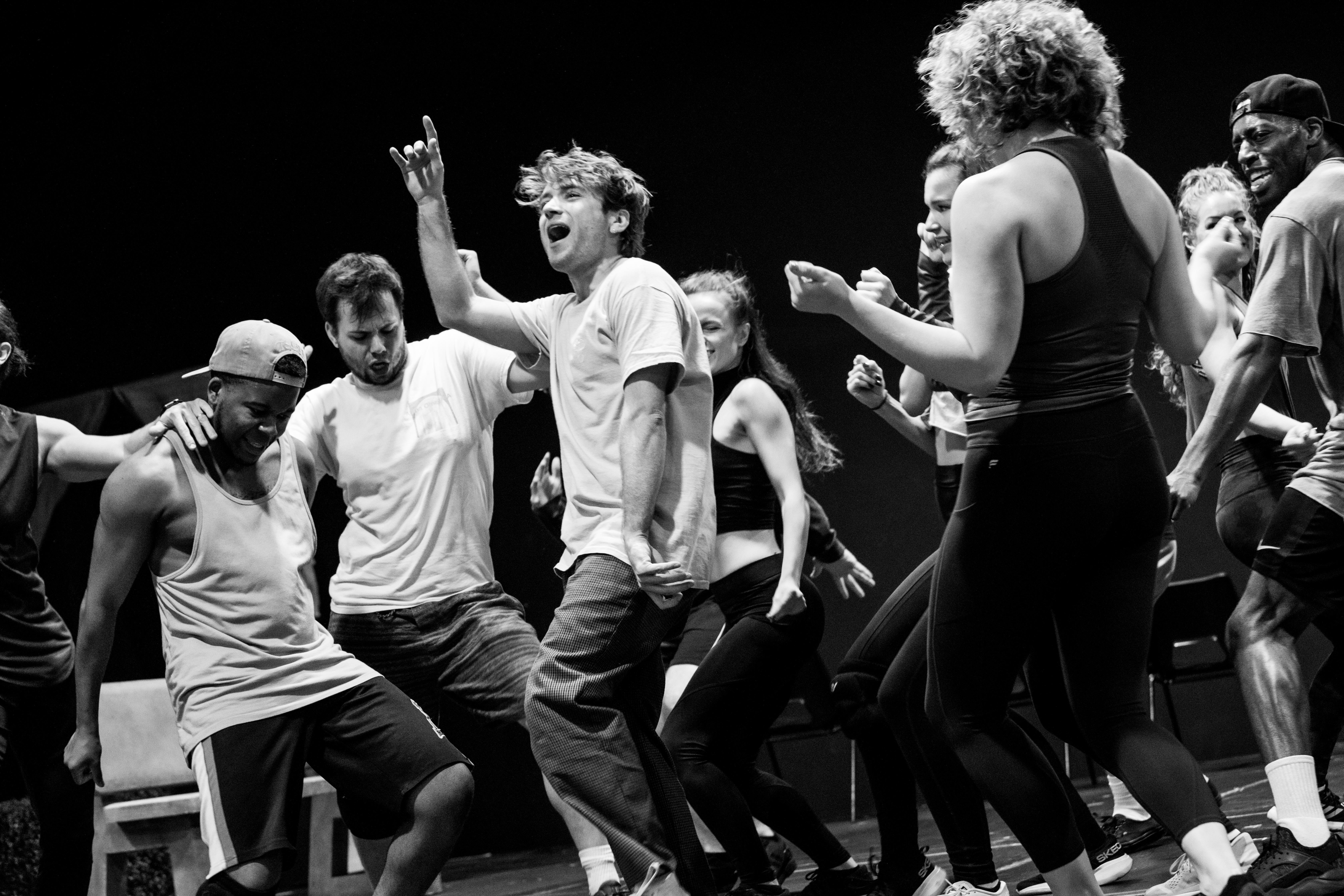 Olly Dobson (centre) and the company in rehearsals for Back to the Future The Musical, credit Sean Ebsworth Barnes